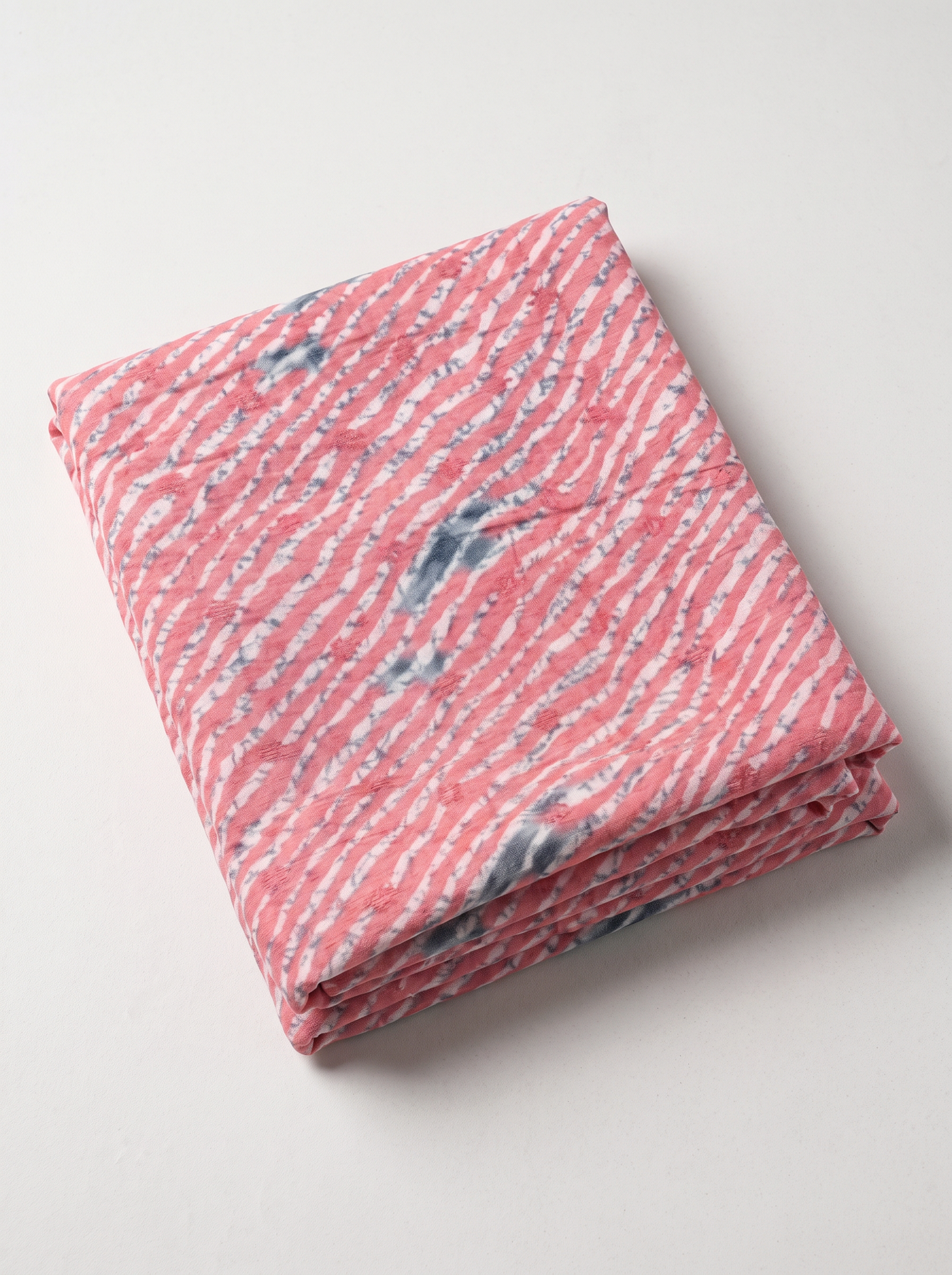 Coral Pink Leheriya Print Muslin Cotton Than Fabric sold by meter at Bana