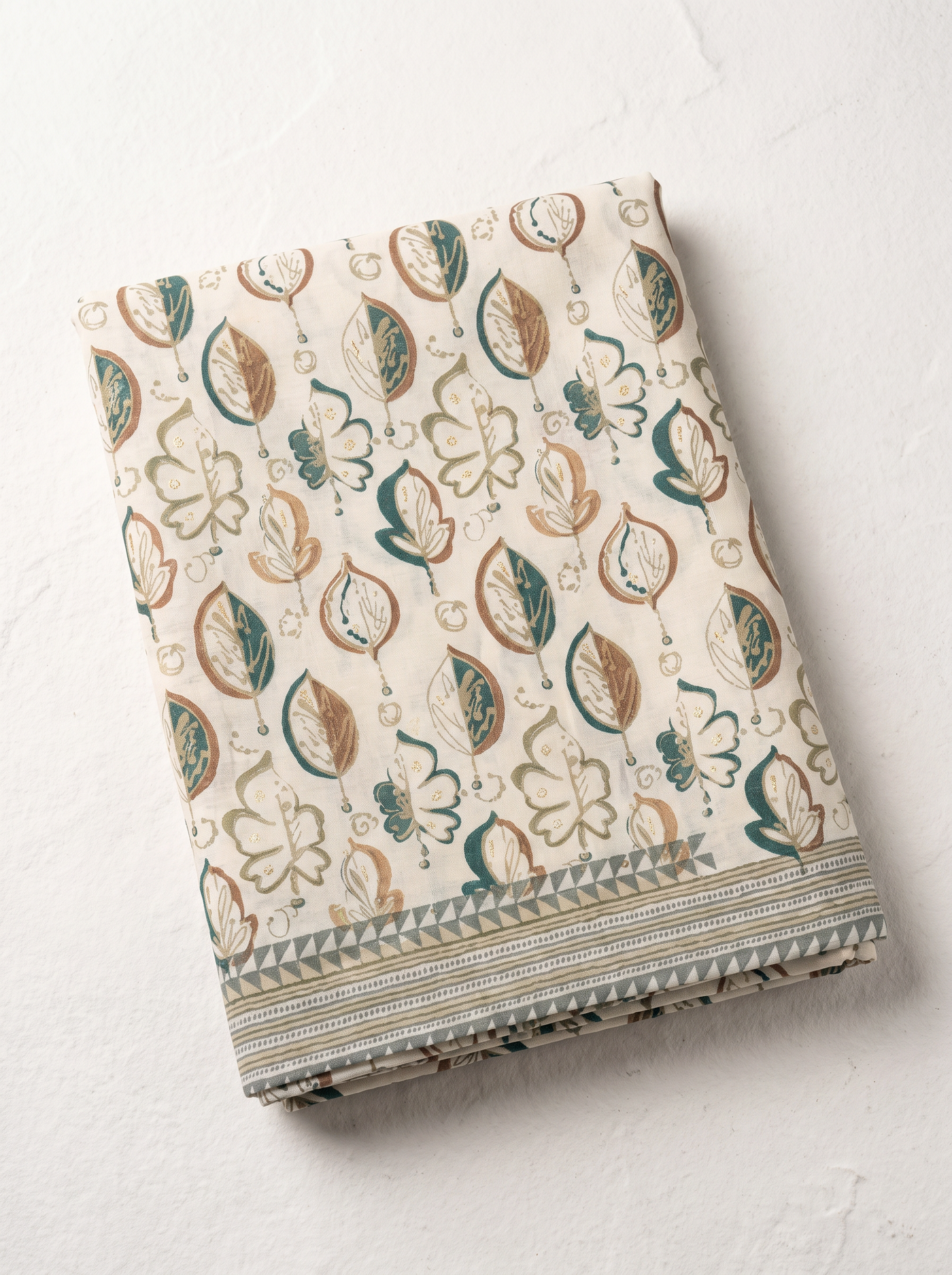 Ivory Leaf Print Leaf Print Muslin Cotton Than Fabric sold by meter at Bana