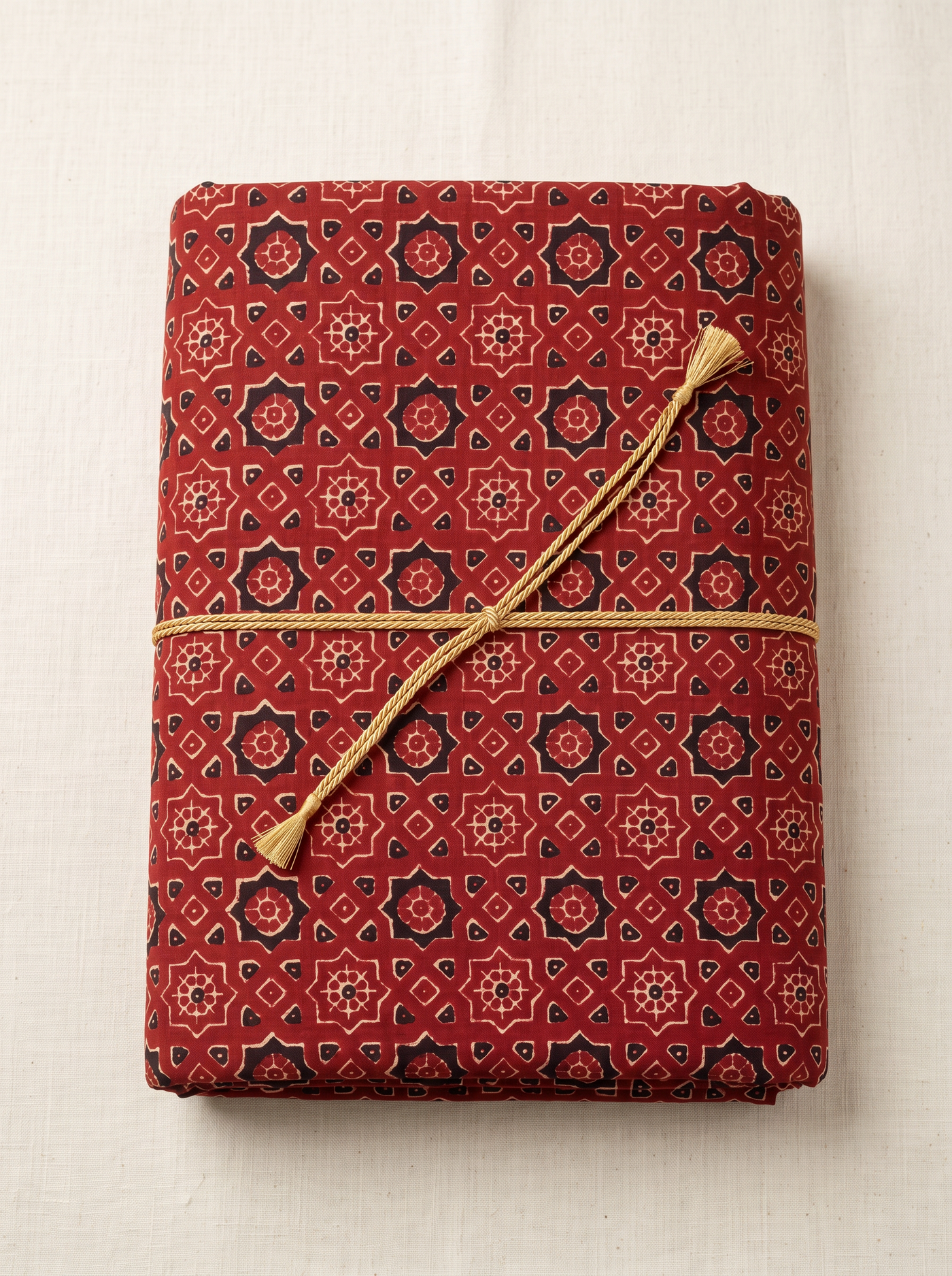 Rust Red Ajrakh Print Cotton Than Fabric sold by meter at Bana